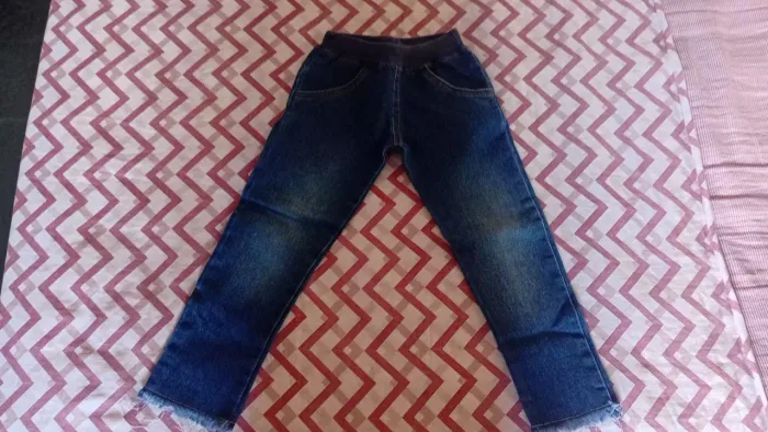Calça jeans menina e camisa xadrez Tam 2