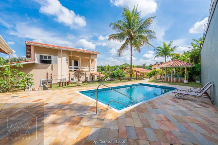 Casa com 4 dormitórios à venda, 416 m² por R$ 1.910.000,00 - Condomínio Marambaia - Vinhed