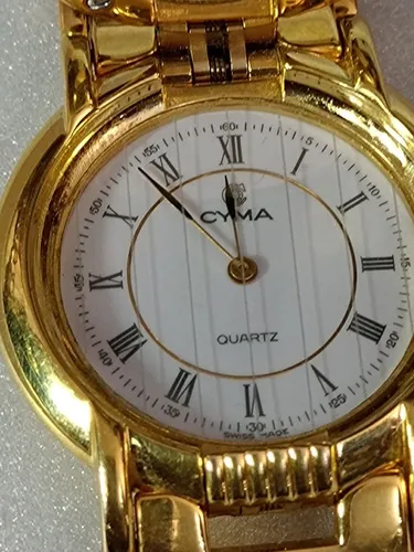 Relógio marca Cyma bracelete em PVD amarelo modelo duface