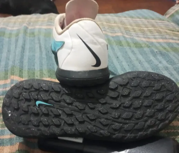 Chuteira Nike futebol society <br>Quando a