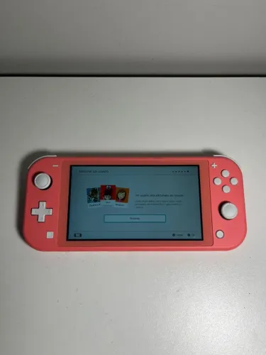 Nintendo Switch Lite Coral + Case