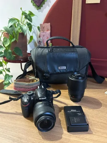 Camera Nikon D3200 + lente 18-35mm + lente55-200mm + bolsa, alça e carregador