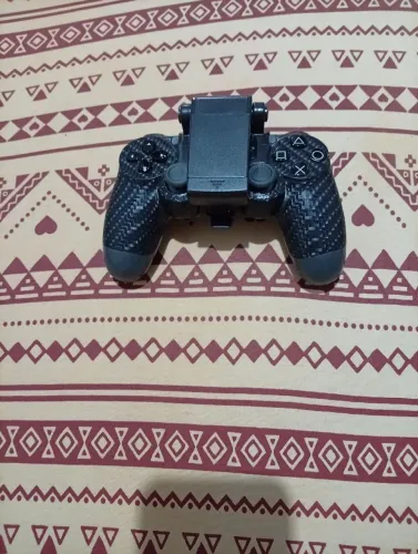 Controle ps4 ? com suporte para celular ?