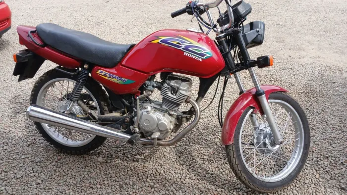 Vendo titan 125 ano 99 .