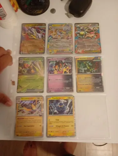 Cartas de pokémon raras se comprar ganhar o brinde de 5 cartas comuns aleatórias