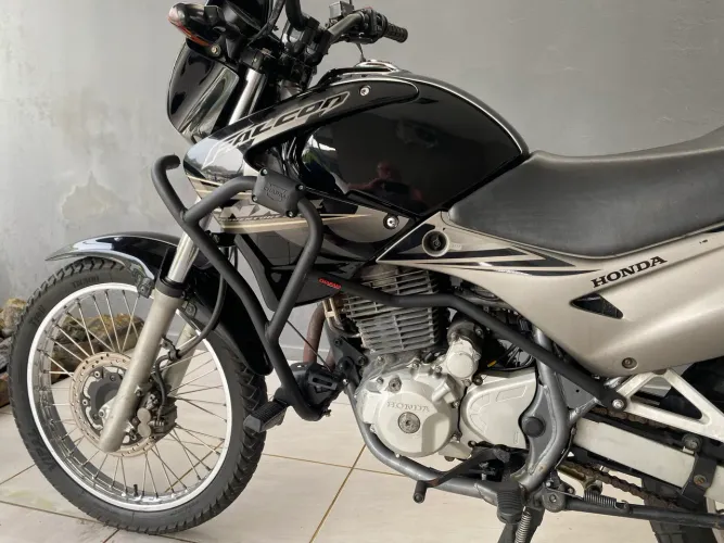 Falcon NX 400 troco por carro