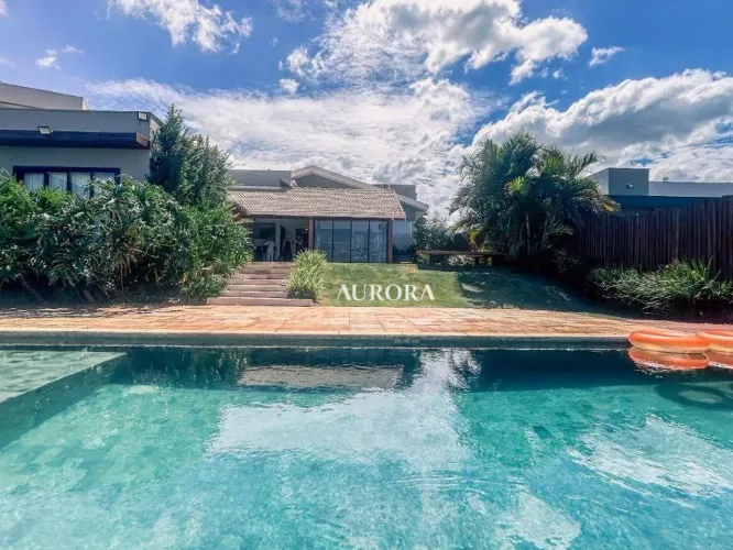 Casa com 4 dormitórios à venda no condomínio Punta Del Este, 272 m² por R$ 4.500.000,00 -