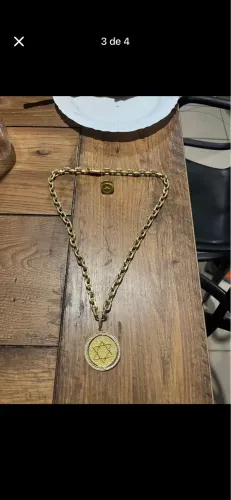 Vendo cordão moeda antiga