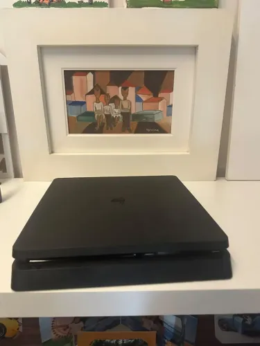 Ps4 slim 1tb em ótimas condições