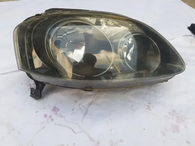 Farol polo 2005 a 2009 fumê 