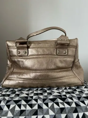 bolsa dourada couro legítimo regina rios