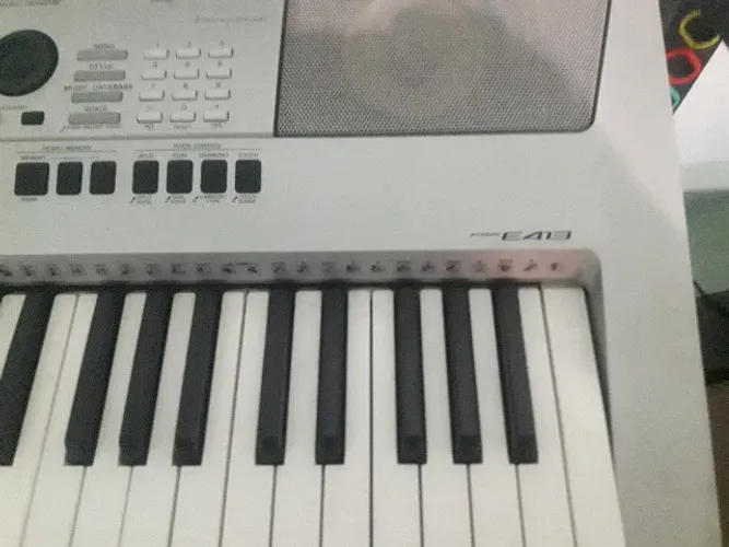 teclado yamaha psr E413