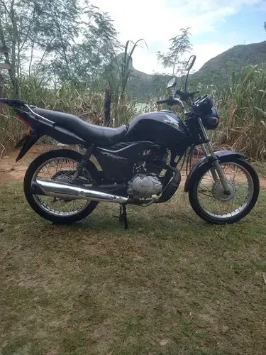 Vendo ou troco por carro essa fan 125 partida