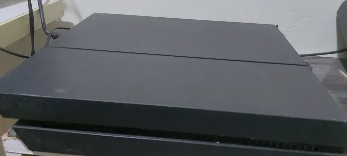 PlayStation 4 usado com capa