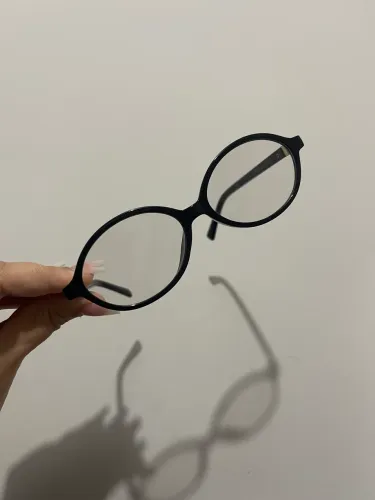 Óculos lente transparente que escurece no sol
