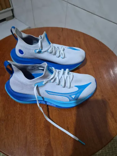 Tenis de corrida