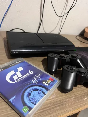 Ps3 slim 500gb com 70 jogos na memória