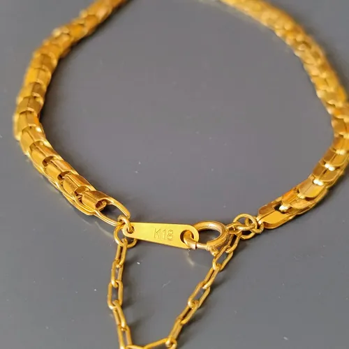 Pulseira trabalhada em ouro 18 k