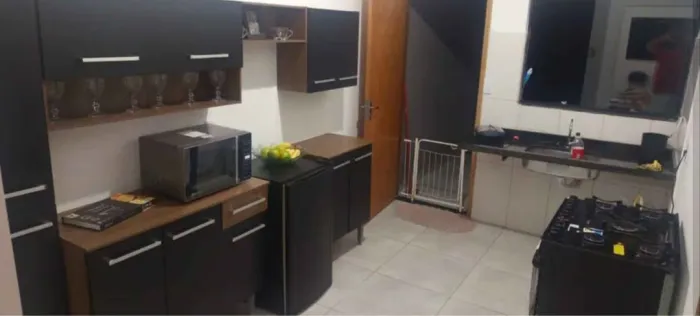 Armário de cozinha e painel 
