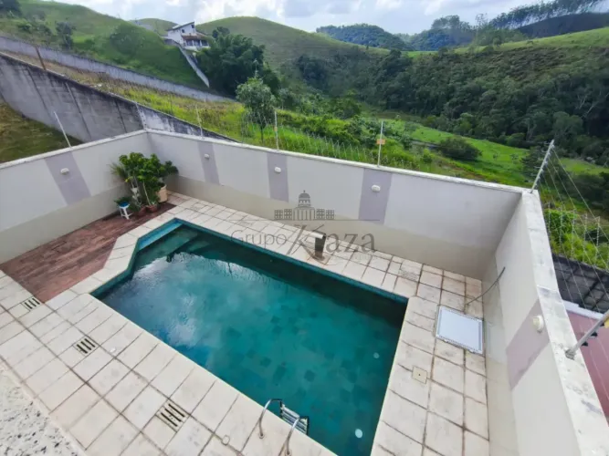 Casa em Condomínio - Condomínio Residencial Mantiqueira - 4 Dormitórios - 344m².