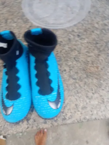 Chuteira mercurial cano alto