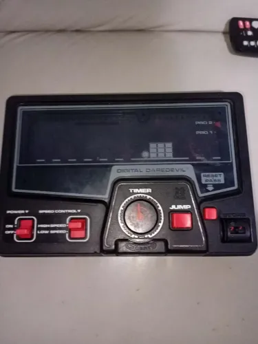 Mini game antigo 2 peças pac man e bike tomy anos 80