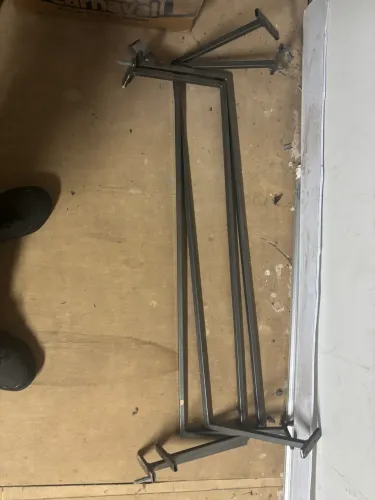 Cabideiro de roupas em metal para parede