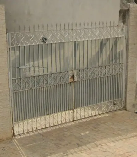 Portão de garagem de ferro