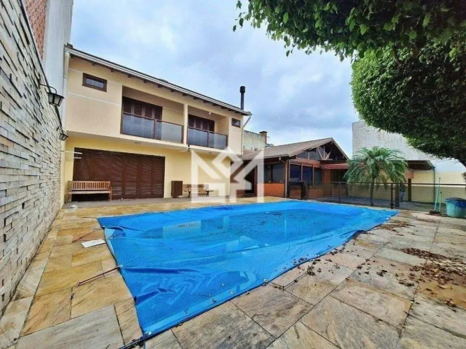 Casa para aluguel em Gravataí - Monte Belo, 3 suítes, piscina & churrasqueira