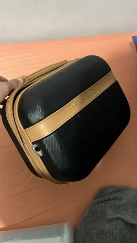 vendo essa frasqueira preto com detalhes marrom nova, uso unissex !!