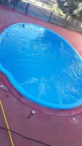 Piscina de fibra oval 8M