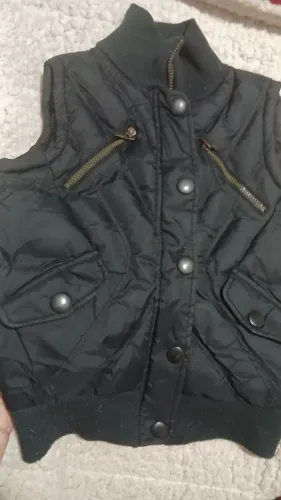 Colete estilo e em ótimo estado