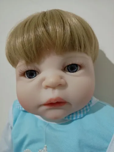 Bebê reborn 55cm todo vinil