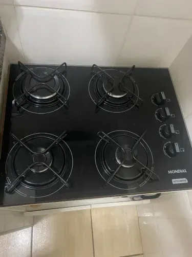 Fogão cooktop em perfeito funcionamento com armário 