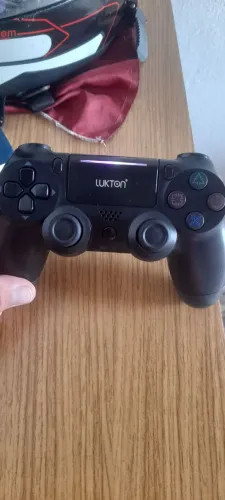 Controle de ps4 zero pra bota preço