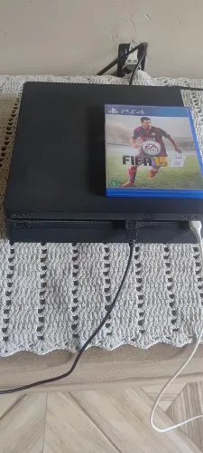 Vendo ps4 slim 1tb com 16 jogos e 2 controles