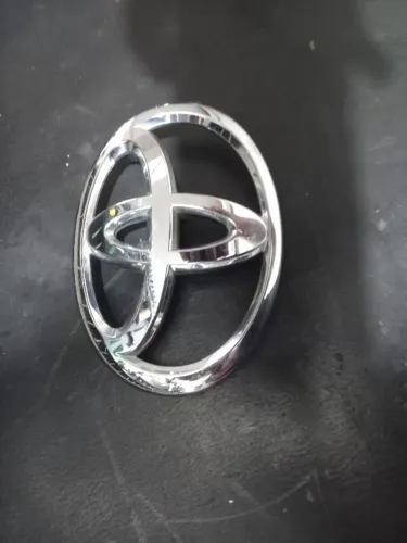 Emblema frontal Toyota Corola 09-14