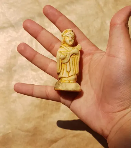 Escultura de resina deus da sorte