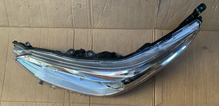 Farol Yaris cromado (manual,novo original)