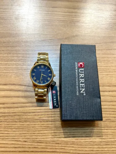 Relógio Masculino Curren Dourado com Mostrador Azul ? luxo e estilo que se destacam!