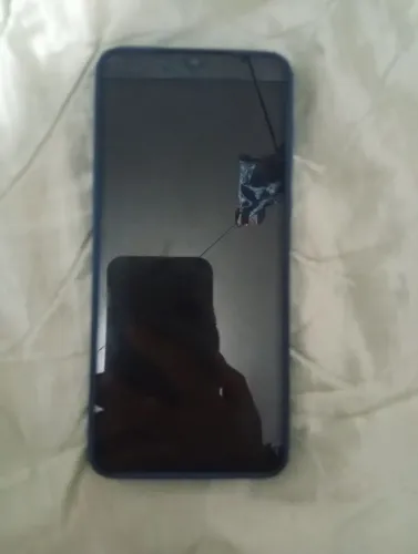 Vendo celular Motorola E13 64 gb