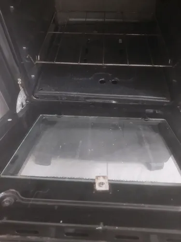 Fogão Esmaltec Bali,4 bocas tradicionais ,mesa inox ,forno funcionando cor preto