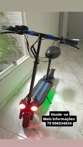 Patinete pouco tempo de uso acompanha Alarme