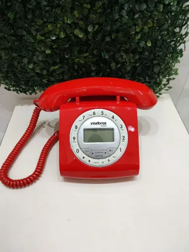 Telefone fixo vintage vermelho brilhante