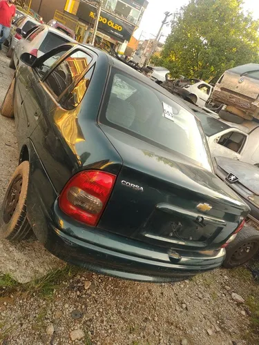 Tampa traseira para-choque lanterna GM Corsa sedan ano 2000