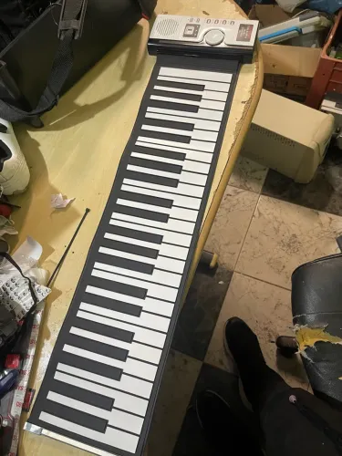 Teclado piano de rolo Play N Roll fácil de guardar