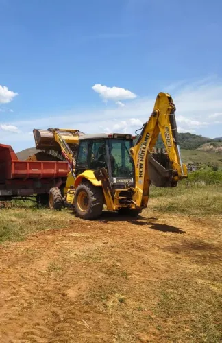Retro escavadeira New Holland