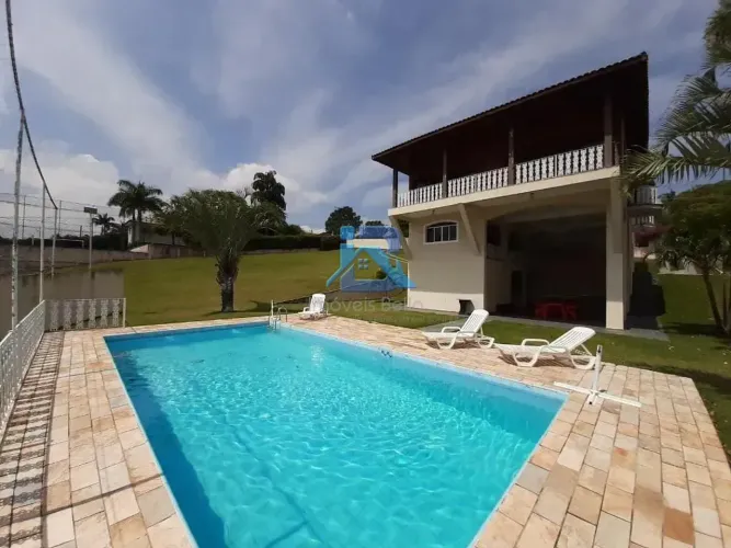 Casa com 3 dormitórios à venda, 510 m² por R$ 1.500.000,00 - Condomínio Cachoeiras do Imar