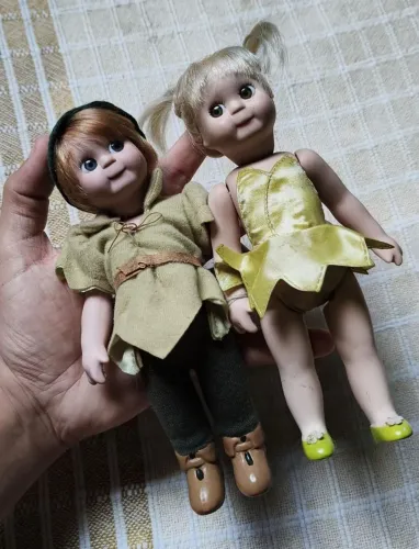 Bonecos de porcelana Peter pan e cininho