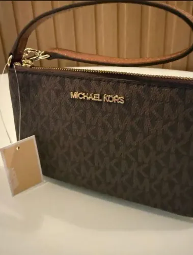 Bolsa michael kors clutch monograma